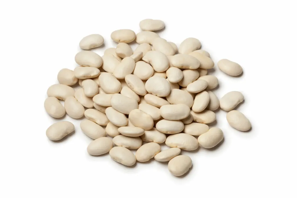 lima beans on a white platform