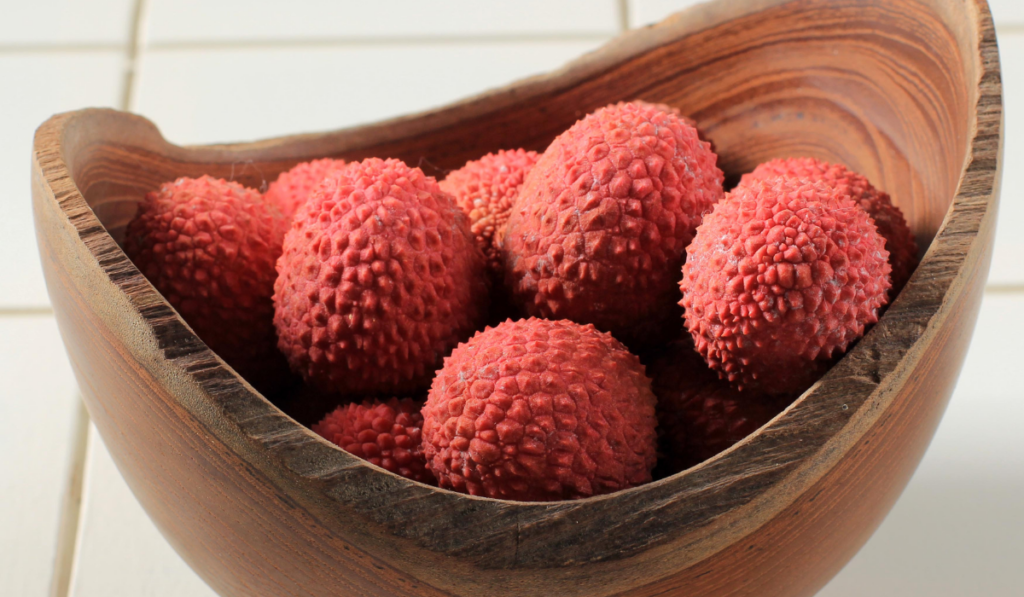 Fresh Lychee on a Wooden Bowl